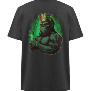 Auf einem schwarzen T-Shirt ist die Grafik eines muskulösen Gorillas mit einer Krone abgebildet. Der Gorilla ist in Grüntönen dargestellt und von grünem Rauch umgeben. Er hat geballte Fäuste und einen intensiven Gesichtsausdruck.