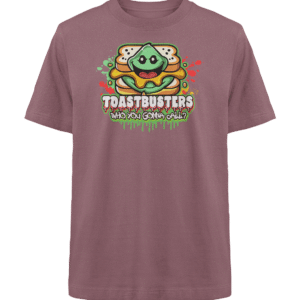 Ein malvenfarbenes T-Shirt mit einem Cartoon-Sandwich und einem lächelnden Gesicht. Darüber steht fett „Toastbusters“ und darunter „Wen rufst du an?“ in einer verspielten, schleimartigen Schriftart.