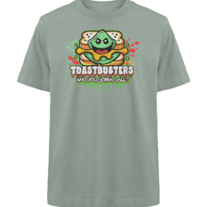 Ein graues T-Shirt mit einem Cartoon-Sandwich mit einer lächelnden grünen Füllung, die an ein Gespenst erinnert. Der Text lautet Toastbusters: Wen rufst du an? in farbenfroher, verspielter Schrift.