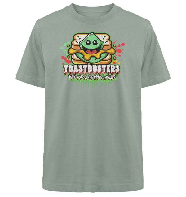 Ein graues T-Shirt mit einer Sandwich-Cartoonfigur mit einem glücklichen Gesicht. Der Text lautet oben TOASTBUSTERS und unten WHO YOU GONNA CALL?, beides in bunten Buchstaben.